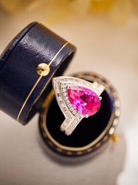Platinum-Plated Pear-Shaped Red Zircon Ring with Diamond Accents